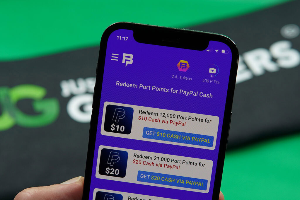 Photo of Patrik Lidin showing the Bingoport Terms and Conditions for minimum SC cashout rules.