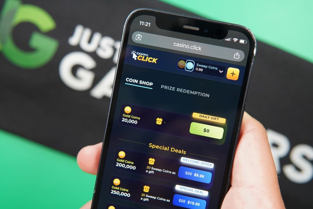 Patrik Lidin holding an iPhone with the Casino Click casino purchases page loaded on the webpage.