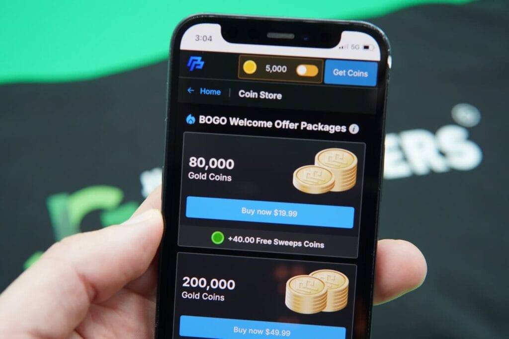 Patrik Lidin holding an iPhone with the PeakPlay casino coin purchase page loaded on the webpage.