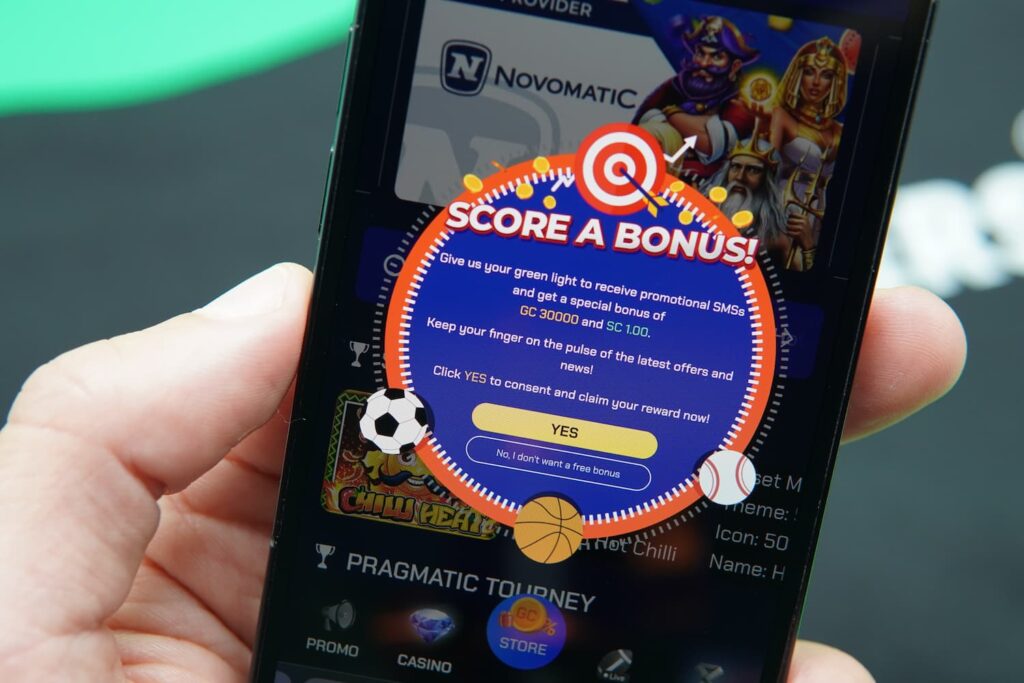 Patrik Lidin holding an iPhone with the Sportzino casino promotions page loaded on the webpage.